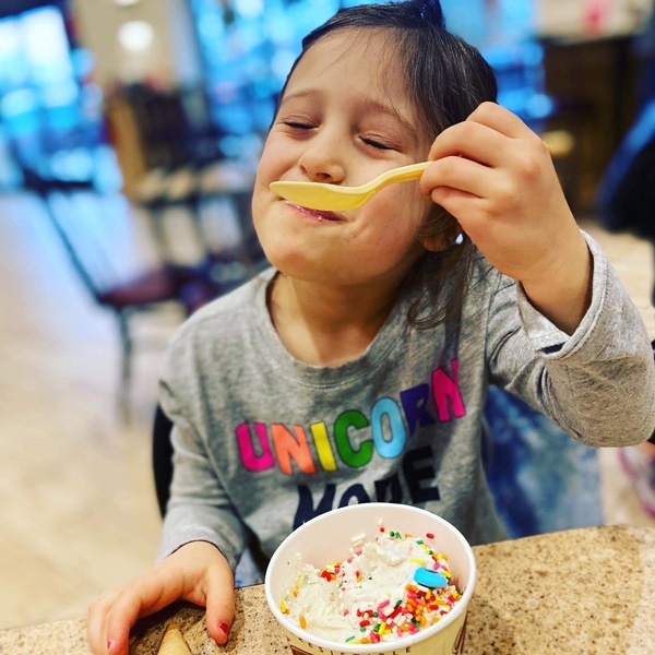 One of Gina Forster's children eating ice cream